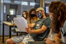 students in classroom with masks