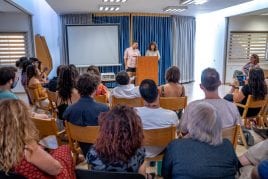 speakers and audience during Spring 2021 graduation ceremony