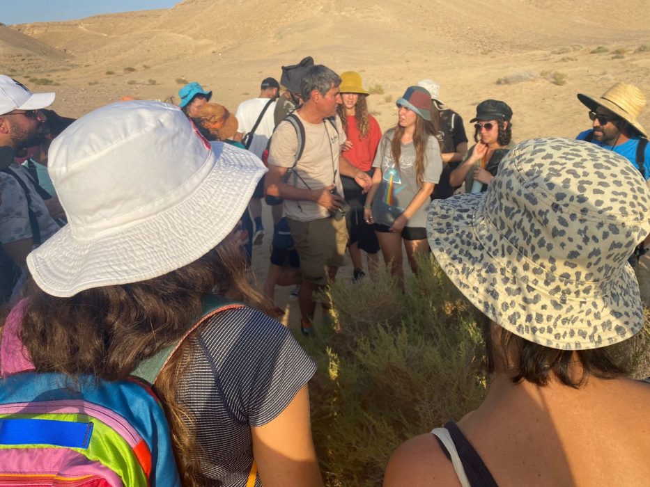 students during an outdoor session in the desert